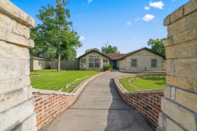 7847 Broadview Dr, Houston, TX 77061 - view of green lawn featuring asphalt driveway