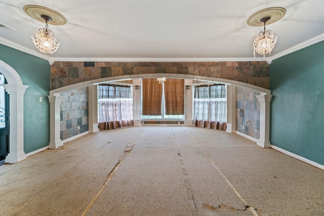 7847 Broadview Dr, Houston, TX 77061 - entrance foyer with crown molding, plenty of natural light, a chandelier, and arched walkways
