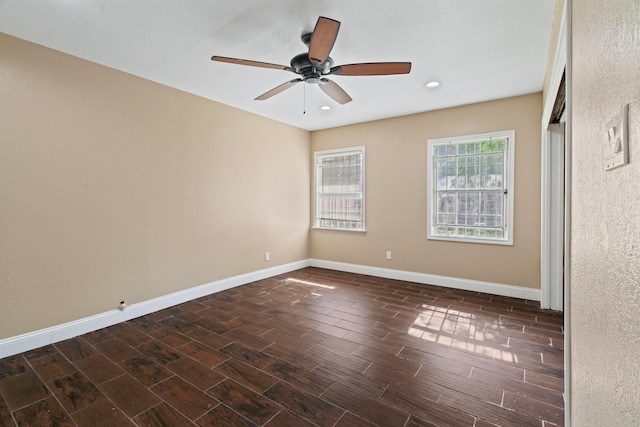 7847 Broadview Dr, Houston, TX 77061 - empty room with a ceiling fan, recessed lighting, and wood tiled floors