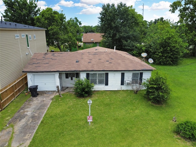 3521 Mount Pleasant St, Houston, TX 77021 - view of front facade featuring driveway, a garage, and a front lawn