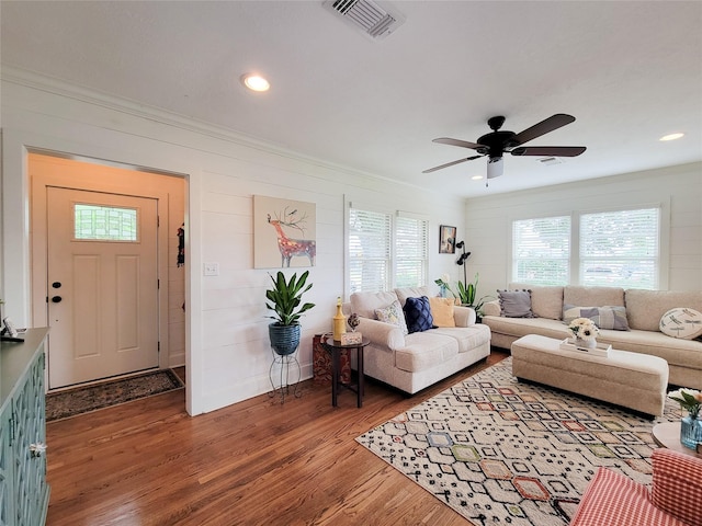 505 S Jackson St, Brenham, TX 77833 - living room featuring wood finished floors, ceiling fan, ornamental molding, and recessed lighting