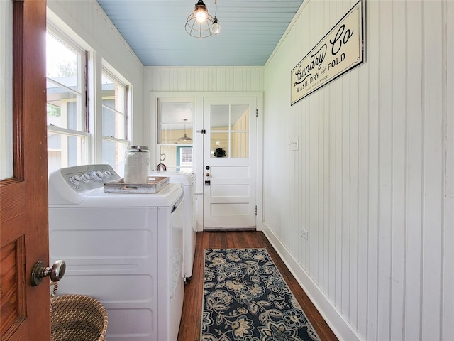 505 S Jackson St, Brenham, TX 77833 - washroom featuring washing machine and dryer, dark wood-style floors, wood walls, and crown molding