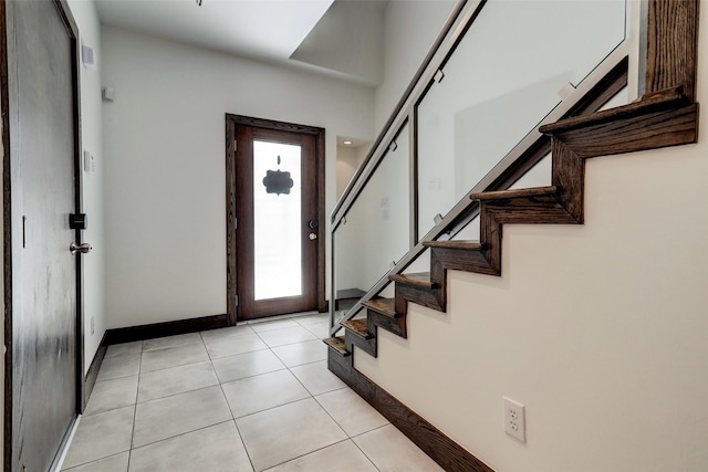 1820 Prospect St, Houston, TX 77004 - foyer with stairway and light tile patterned floors