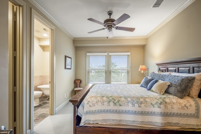 5023 La Branch St, Houston, TX 77004 - carpeted bedroom with ornamental molding, ensuite bathroom, and ceiling fan