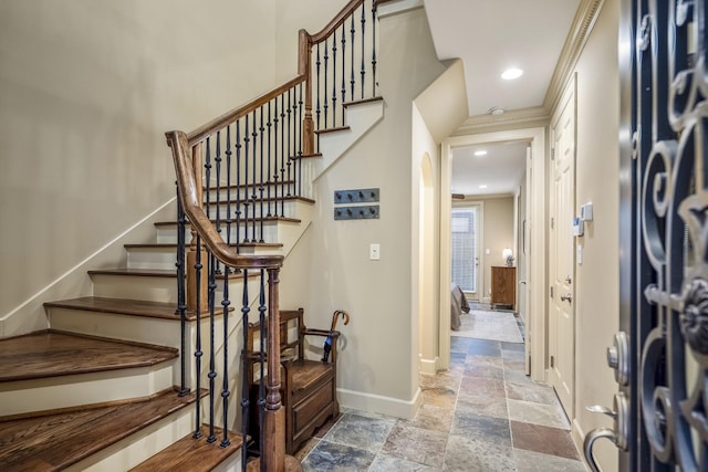 5023 La Branch St, Houston, TX 77004 - entryway with stone tile flooring, stairs, arched walkways, and recessed lighting