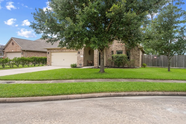 6619 Crystal Forest Trl, Katy, TX 77493 - obstructed view of property with an attached garage, brick siding, and driveway