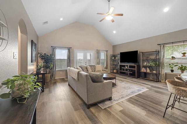 6619 Crystal Forest Trl, Katy, TX 77493 - living room with ceiling fan, high vaulted ceiling, healthy amount of natural light, wood finished floors, and recessed lighting