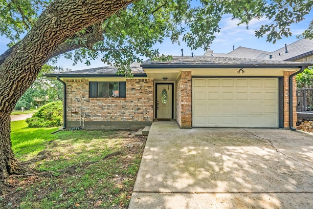 101 Fairway View Ln, Montgomery, TX 77356 - view of front of home with driveway, an attached garage, brick siding, and a front yard