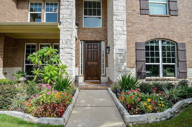 25718 Creek Ledge Dr, Katy, TX 77494 - view of exterior entry featuring brick siding