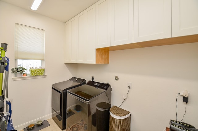 25718 Creek Ledge Dr, Katy, TX 77494 - laundry room with cabinet space and washing machine and dryer