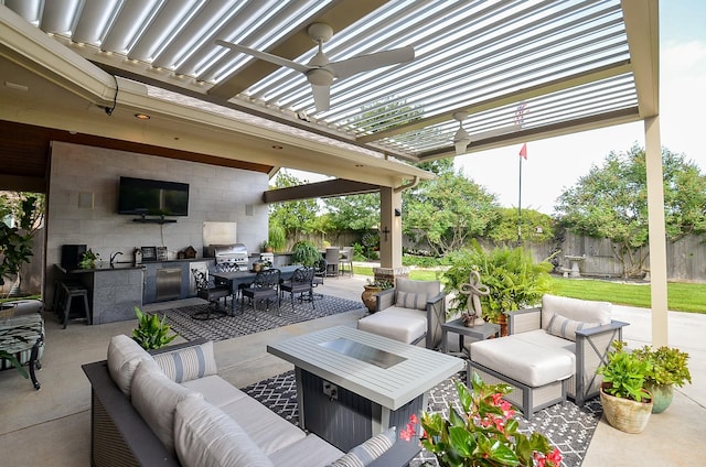 25718 Creek Ledge Dr, Katy, TX 77494 - fenced backyard featuring an outdoor hangout area, an outdoor kitchen, outdoor dining area, a pergola, and a patio area
