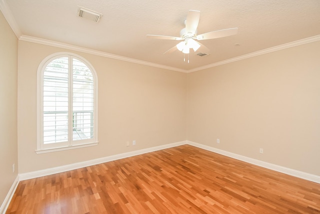 9610 Oakland Lake Way, Missouri City, TX 77459 - spare room featuring light wood-type flooring, ceiling fan, and crown molding