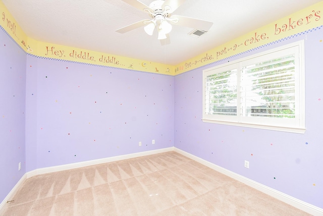 9610 Oakland Lake Way, Missouri City, TX 77459 - unfurnished room with light colored carpet and a ceiling fan