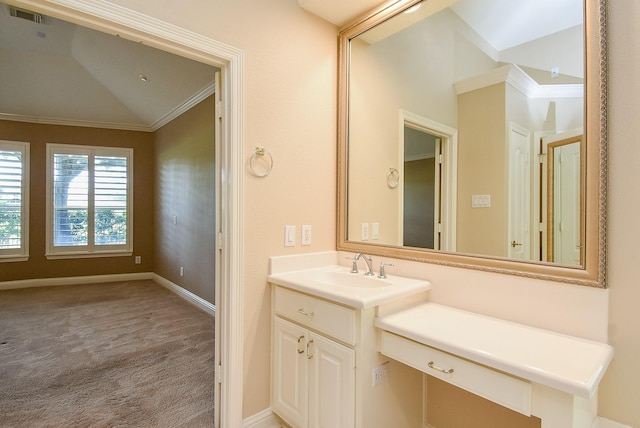 9610 Oakland Lake Way, Missouri City, TX 77459 - bathroom with ornamental molding, vanity, and lofted ceiling