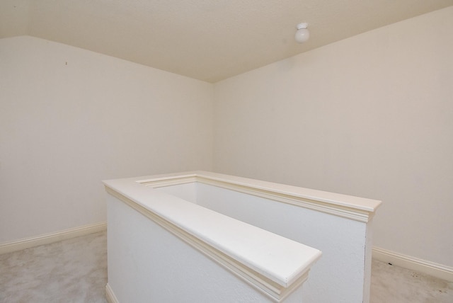 9610 Oakland Lake Way, Missouri City, TX 77459 - hallway with light colored carpet and lofted ceiling