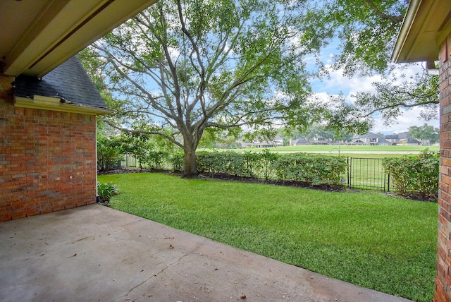 9610 Oakland Lake Way, Missouri City, TX 77459 - fenced backyard with a patio area