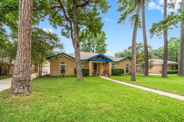 27225 Orth Ln, Conroe, TX 77385 - ranch-style house with brick siding
