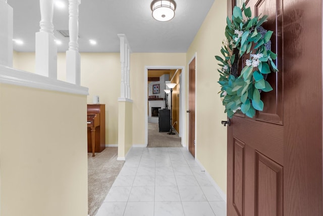 27225 Orth Ln, Conroe, TX 77385 - corridor with light carpet and light marble finish flooring