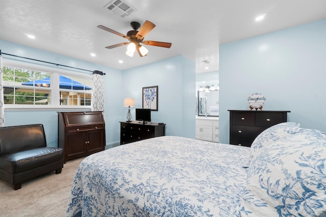 27225 Orth Ln, Conroe, TX 77385 - bedroom with light colored carpet, recessed lighting, a ceiling fan, and ensuite bath