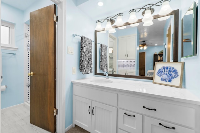 27225 Orth Ln, Conroe, TX 77385 - full bath with vanity, a ceiling fan, wood finished floors, and a shower
