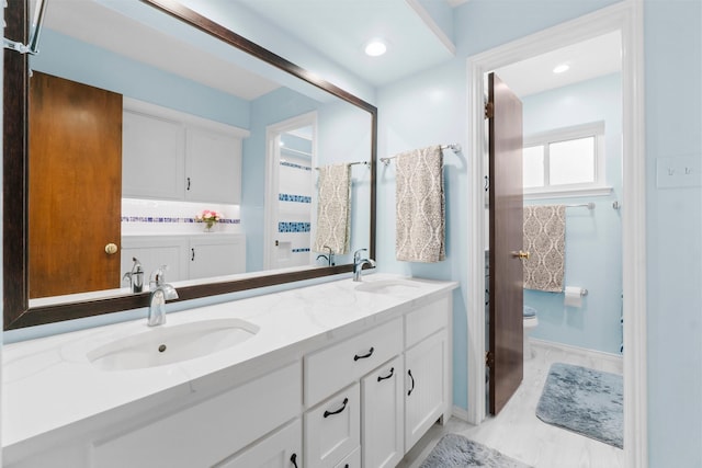 27225 Orth Ln, Conroe, TX 77385 - full bath featuring double vanity and toilet