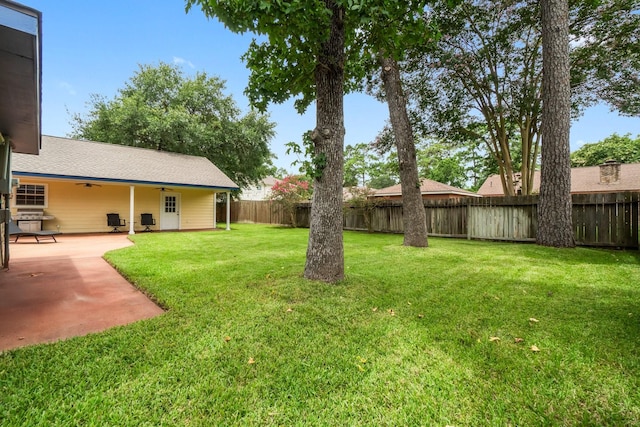 27225 Orth Ln, Conroe, TX 77385 - fenced backyard featuring ceiling fan and a patio