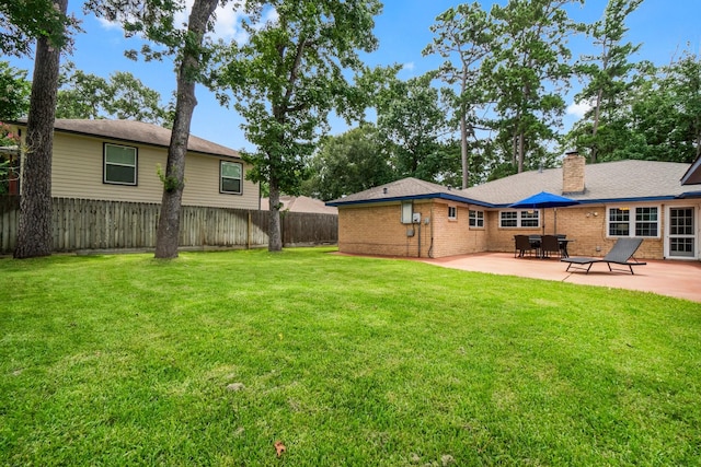 27225 Orth Ln, Conroe, TX 77385 - fenced backyard featuring a patio