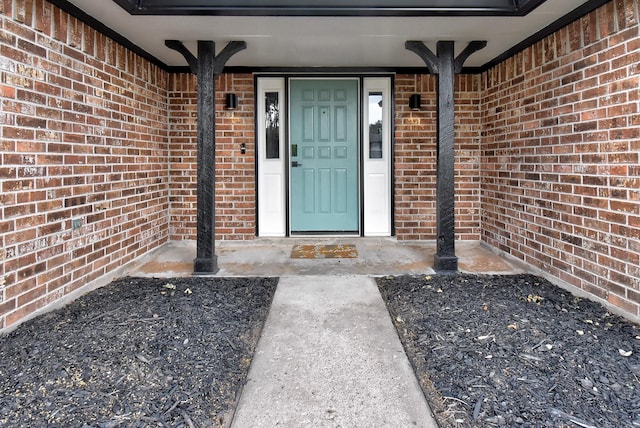 510 Daffodil St, Lake Jackson, TX 77566 - doorway to property featuring brick siding