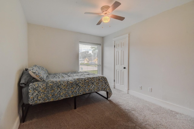 510 Daffodil St, Lake Jackson, TX 77566 - carpeted bedroom featuring a ceiling fan and baseboards