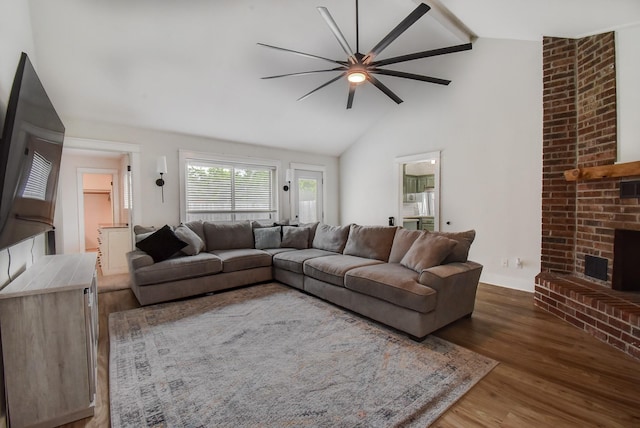 510 Daffodil St, Lake Jackson, TX 77566 - living area with ceiling fan, wood finished floors, beam ceiling, and high vaulted ceiling