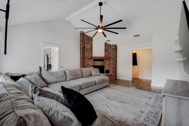 510 Daffodil St, Lake Jackson, TX 77566 - living area with a ceiling fan, wood finished floors, and a fireplace