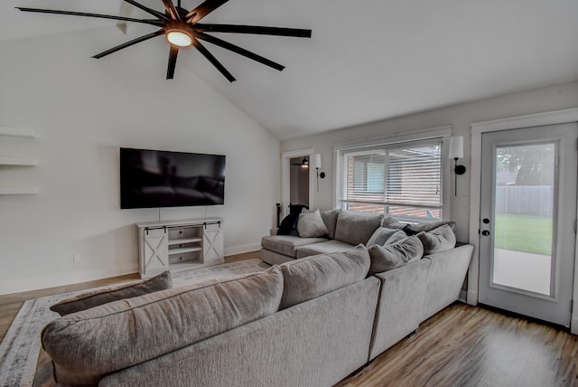 510 Daffodil St, Lake Jackson, TX 77566 - living room with wood finished floors, ceiling fan, and vaulted ceiling