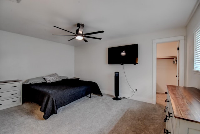 510 Daffodil St, Lake Jackson, TX 77566 - bedroom with carpet floors, a spacious closet, and a ceiling fan