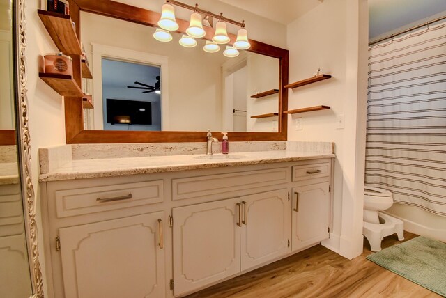 510 Daffodil St, Lake Jackson, TX 77566 - bathroom featuring vanity and wood finished floors