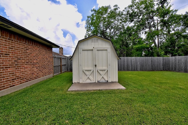 510 Daffodil St, Lake Jackson, TX 77566 - view of shed featuring a fenced backyard