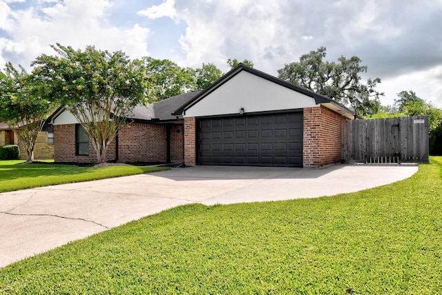 510 Daffodil St, Lake Jackson, TX 77566 - ranch-style house featuring an attached garage, driveway, and brick siding