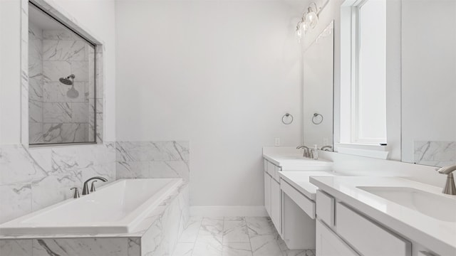 15139 Botanical Garden Dr, Conroe, TX 77302 - full bath with marble look tiles, a garden tub, and double vanity