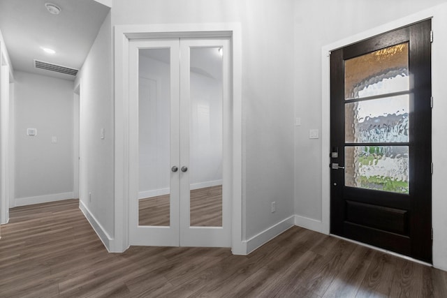 15139 Botanical Garden Dr, Conroe, TX 77302 - entryway with wood finished floors and french doors