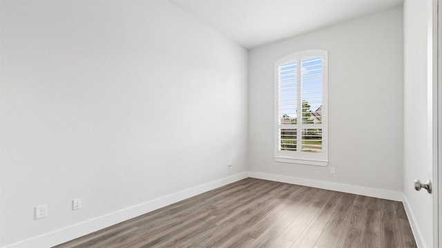 15139 Botanical Garden Dr, Conroe, TX 77302 - empty room with wood finished floors and baseboards