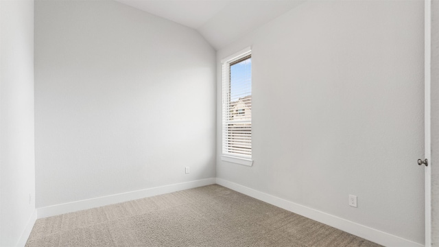 15139 Botanical Garden Dr, Conroe, TX 77302 - empty room featuring light colored carpet and vaulted ceiling