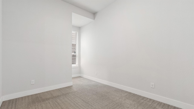 15139 Botanical Garden Dr, Conroe, TX 77302 - empty room with light carpet and baseboards