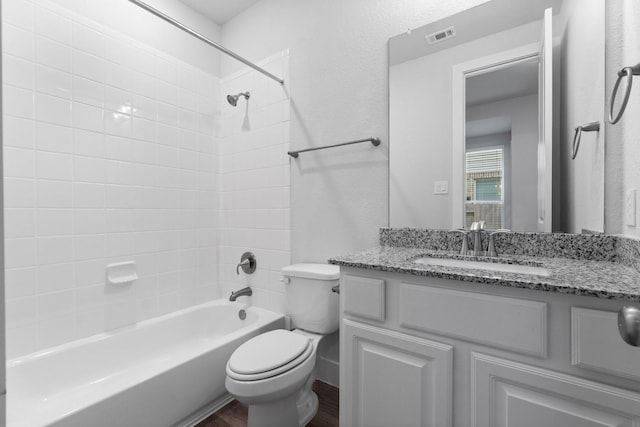 15139 Botanical Garden Dr, Conroe, TX 77302 - bathroom with vanity,  shower combination, and wood finished floors