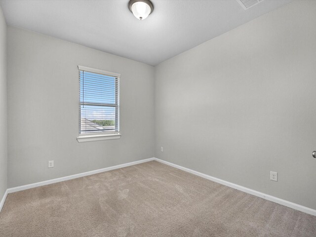 9618 Cambridge Manor Ln, Houston, TX 77045 - carpeted spare room with baseboards