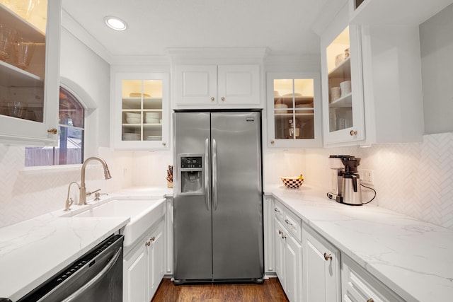 1838 Saxon Dr, Houston, TX 77018 - kitchen featuring appliances with stainless steel finishes, white cabinetry, dark wood finished floors, recessed lighting, and crown molding