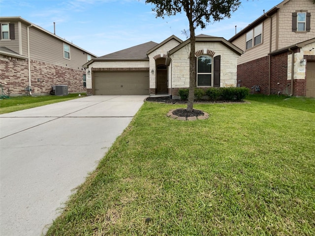 25621 Ramsey Heights Way, Porter, TX 77365 - view of front of house with concrete driveway, an attached garage, a front lawn, stone siding, and brick siding