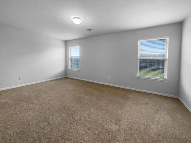 25621 Ramsey Heights Way, Porter, TX 77365 - carpeted spare room featuring baseboards