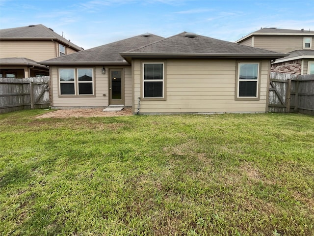 25621 Ramsey Heights Way, Porter, TX 77365 - rear view of house with a fenced backyard and a shingled roof