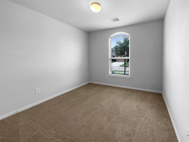 25621 Ramsey Heights Way, Porter, TX 77365 - empty room featuring carpet flooring and baseboards