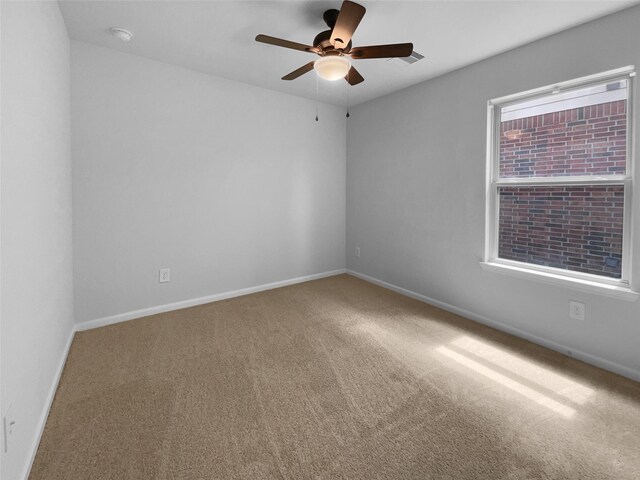 25621 Ramsey Heights Way, Porter, TX 77365 - carpeted spare room with ceiling fan and a smoke detector