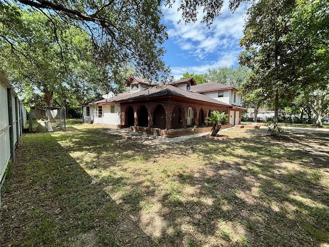 7947 Moore Dr, Pearland, TX 77584 - back of house with brick siding